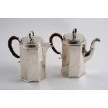 A MODERN OCTAGONAL SMALL COFFEE POT & MATCHING HOT MILK JUG with cane-insulated handles & ring