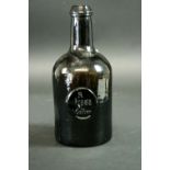 A SEAL BOTTLE the cylindrical body with a seal  R Bragg, So. Molton, base indistinctly moulded H.