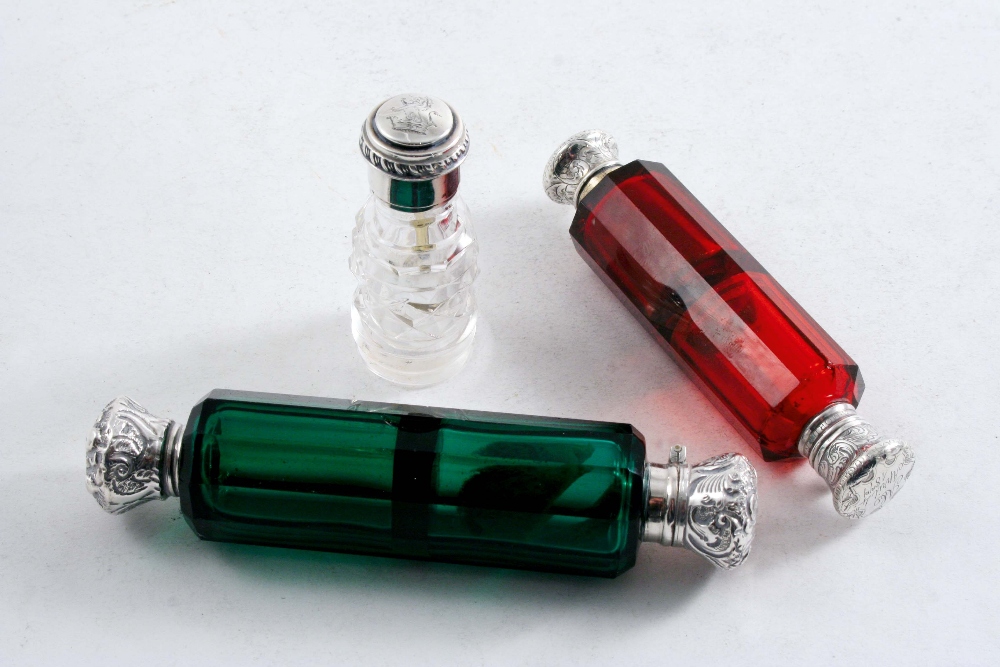 TWO VICTORIAN MOUNTED COLOURED GLASS SCENT BOTTLES (one by S. Mordan & Co., one unmarked) and a late