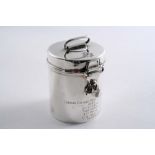 REGIMENTAL INTEREST: An Edwardian canister with a hasp & staple closure engraved with the badge of