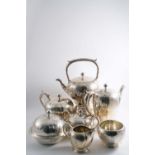 AN AMERICAN SIX-PIECE TEA & COFFEE SERVICE comprising kettle on stand with burner, tea pot, coffee