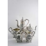 A VICTORIAN MATCHING TEA POT, COFFEE POT & TWO MILK JUGS with embossed & fluted decoration, (the
