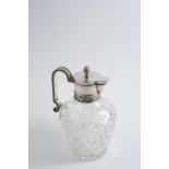 BY KARL FABERGE: A late 19th / early 20th century Russian mounted cut-glass claret jug with an