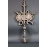 A BRONZE BANNER FINIAL incised with calligraphy, 22 3/4ins. (58cms.) high