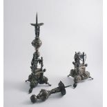 A PAIR OF 19TH CENTURY CONTINENTAL "PRICKET" CANDLESTICKS on shaped, triform bases, decorated with