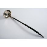 A GEORGE III SCOTTISH PROVINCIAL PUNCH LADLE with a shallow circular bowl & a twisted whalebone