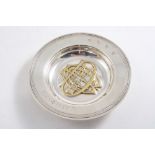 A SMALL CONTEMPORARY COMMEMORATIVE DISH with a monogram in the centre, made for the centenary of
