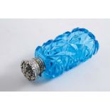 A VICTORIAN MOUNTED AQUAMARINE-COLOURED GLASS SCENT BOTTLE with embossed, hinged cover, unmarked;