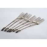 A SET OF SIX LATE 19TH CENTURY CONTINENTAL FORKS with apostle terminals & "twist" stems with