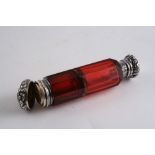 A VICTORIAN RUBY GLASS DOUBLE ENDED SCENT BOTTLE with plated ends;  10 cms