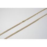 A 9CT. GOLD FLAT CURB LINK NECKLACE 59.5cm. long, 20 grams.