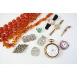 A QUANTITY OF JEWELLERY including a jade and 14ct. gold ring, size M, two amber necklaces, and