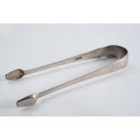 A PAIR OF EARLY 19TH CENTURY AMERICAN SUGAR TONGS with small, scoop-like bowls, initialled "EW",