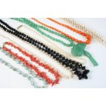 A CORAL NECKLACE 22 grams, a graduated jet necklace, a graduated cultured pearl necklace and various