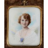 W.HILL THOMSON A.R.M.S. Miniature portrait of a lady with floral corsage on ivory, c.1900; 7.5 x 6.