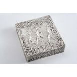 A CONTINENTAL DECORATIVE SQUARE BOX with figures dancing on the cover, in relief, 1900-1920;  3.25"