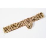 A 9CT. GOLD FANCY GATE LINK BRACELET with padlock clasp, 18cm. long, 21 grams.