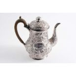 A 19TH CENTURY EMBOSSED BALUSTER COFFEE POT with two cartouches, one initialled, unmarked;  9"  (