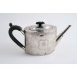 A GEORGE III ENGRAVED OVAL TEA POT with a straight spout, crested, by Michael Plummer, London 1793;