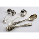 A PAIR OF VICTORIAN SILVERGILT FRUIT SERVING SPOONS Bacchanalian pattern, with fluted bowls, by W.