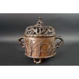 A BRONZE INCENSE BURNER AND COVER the body cast in low relief, with bamboo stems and foliage, the