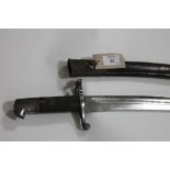 AN 1858 PATTERN BAYONET, An unmarked 1858 short rifle pattern sword bayonet with yatagan blade, with