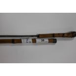 A SWORDSTICK. A Bamboo cane mounted swordstick, with square form tapering blade, 22.3/4" in length.