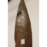 A PACIFIC ISLANDS PADDLE. A 19thC paddle of a lighter hue hardwood, measuring 63" overall length.