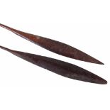 A BRACE OF HARDWOOD PADDLES. Two 19thC Pacific Islands leaf shaped paddles, in similar styles.