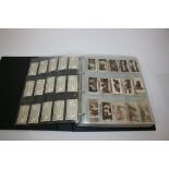 CIGARETTE CARDS 3 large albums of cigarette cards and tea cards, including De Reszke Dogs, Wills