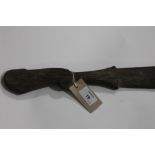 A NATIVE CEREMONIAL CLUB. A native hardwood ceremonial club of some 38" in overall length. Of a