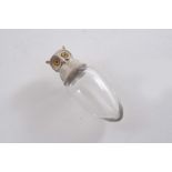 A LATE VICTORIAN SMALL MOUNTED CLEAR GLASS SCENT BOTTLE oviform with an owl mask screw cover, set