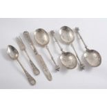 A SET OF FOUR LATE 19TH CENTURY DUTCH SPOONS with oval bowls, decorated on the back with a