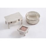 A DOUBLE COMPARTMENT STAMP BOX in the form of a side table by A & J. Zimmerman, Birmingham 1919