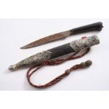 A 19TH CENTURY TURKISH KARD KNIFE with steel blade, horn hilt and a mounted leather scabbard with