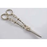 A PAIR OF VICTORIAN PARCELGILT GRAPE SHEARS with figural stems & ring handles, by William Edwards,