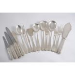A 20TH CENTURY CONTINENTAL MATCHED PART CANTEEN OF FLATWARE & CUTLERY INCLUDING: Six table spoons,