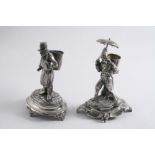 TWO 19TH CENTURY CONTINENTAL FIGURES (possibly toothpick holders); one in the form of a street