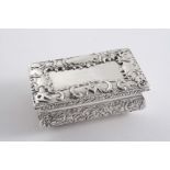 AN EARLY VICTORIAN RECTANGULAR SNUFF BOX with chased convex sides, the cover with a border of