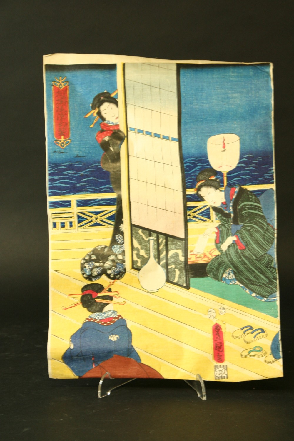 A GROUP OF TWELVE JAPANESE COLOUR PRINTS showing courtesans, warriors and a battle scene, probably