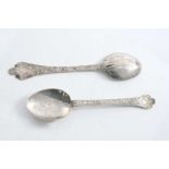 TWO LATE 17TH CENTURY ENGRAVED TREFID SWEETMEAT SPOONS traces of gilding, one initialled "KD" &