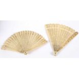 A CHINESE IVORY FAN with floral & brise sticks with landscape medallions; 6"  (15 cms) and part of