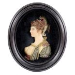 A LARGE WAX PORTRAIT OF A LADY wearing jewelled Empire style costume, head & shoulders, 19th