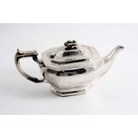 A MODERN TEA POT of shaped oblong form with an angular handle & domed cover by C. Boyton & Sons,