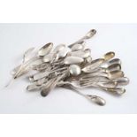 TWELVE VARIOUS CONDIMENT / EGG SPOONS (some Irish), an Exeter cream ladle, a sugar spoon, a caddy