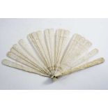 A CHINESE IVORY BRISE FAN guard carveds with dragons, pierced and carved sticks with figures in