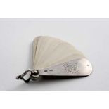 A VICTORIAN PENDANT NOTE PAD in the form of a small "fan" opening to reveal thirteen ivory leaves,