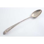 A GEORGE III IRISH BASTING SPOON bright-cut & star pattern with a pointed terminal, by J. Pittar,