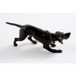 A LATE 19TH / EARLY 20TH CENTURY COLD PAINTED BRONZE MODEL OF A HOUND with a yellow collar, c.1900;