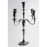 A MODERN FIVE-LIGHT CANDELABRUM on a lobed oval base with a reeded, tapering column & scroll